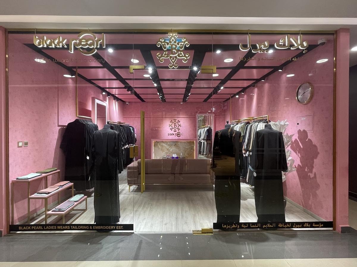 Black Pearl shopfront at J3 Mall with the gold Black Pearl sign and abayas in the window